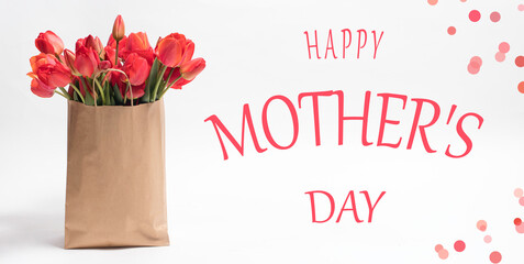 Beautiful long horizontal banner greeting card with tulips with the inscription Happy Mother's Day and place for text