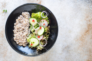 green buckwheat salad vegetables lettuce mix meal snack copy space food background rustic. top view keto or paleo diet vegan or vegetarian food