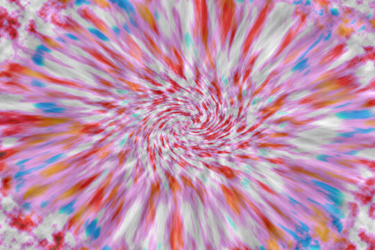 Abstract  tie-dye blend of rainbows  glowing coloured images focused in a explosion pattern.