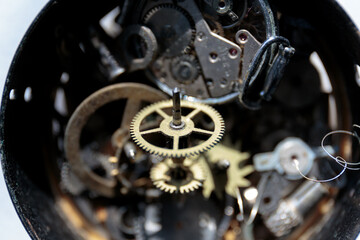 Watch repair. Close up clock mechanism. Dial old style wristwatch. Very shallow depth of field