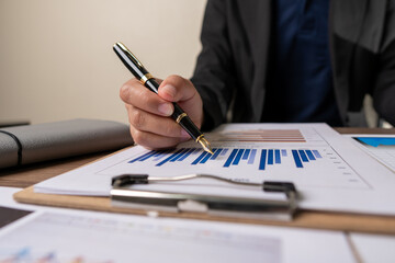 Business Team Entrepreneur discussion and analysis report chart data in office, brainstorming in Meeting and Financial advisor and accounting concept