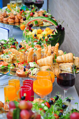 Obraz na płótnie Canvas buffet or catering: snacks, fruit and drinks
