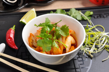 spicy Peking cabbage in a white bowl: Chinese cuisine