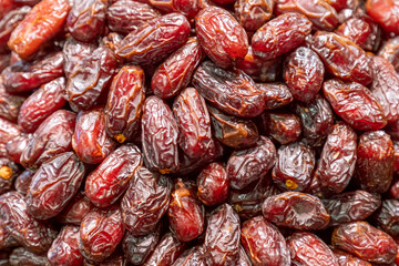 A heap of delicious and sweet dried dates (Selective focus)