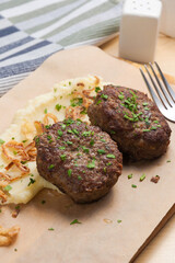 cutlets with mashed potatoes and fried onions. Close up