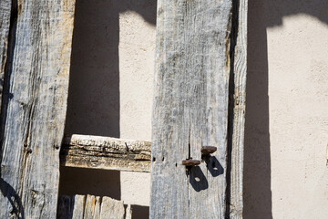detail of rural wooden door with iron latch