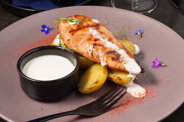 tasty grilled chicken fillet with new potatoes