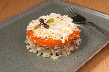Mimosa salad with canned fish. close up