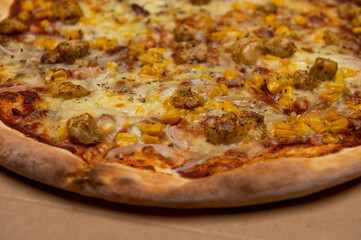 closeup of Hawaiian pizza with pineapple