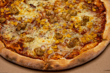 closeup of Hawaiian pizza with pineapple