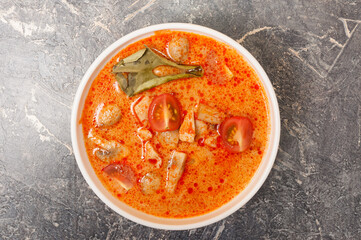 spicy Asian Tom Yam soup with chicken