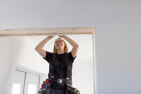 Woman renovating house