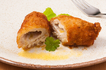 Kiev cutlet on a light plate. close up