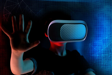 Male hand on the technological background, using the network interface.