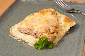 red fish baked in an omelette. close up