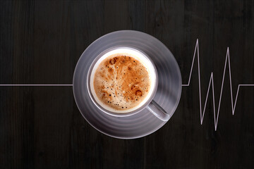 isolated Cappuccino coffee in gray cup, line cardiogram on a dark background, concept fresh, morning coffee, caffeine addiction, energy boost