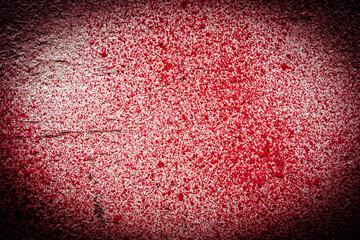 White wall stained with red paint. Close up view