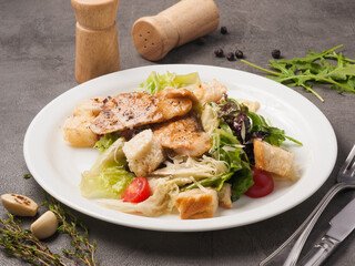Caesar salad with chicken. classic popular salad