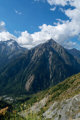 Naklejka premium Hiking near ski station Les deux Alpes and view on Alpine mountains peaks in summer, Isere, France