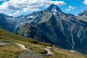Fototapeta premium View on ski station Les deux Alpes and Alpine mountains peaks in summer, Isere, France