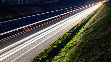 lights of moving cars at night. long exposure