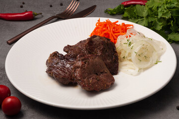 beef shish kebab with spices with onions and carrots