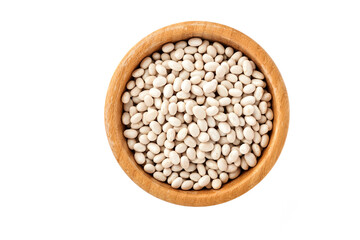 Raw white navy beans in bamboo bowl isolated on white background. Diet for weight loss and fight against cholesterol concept. Top view with copy space.