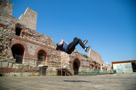 Traceur practicing the art of Parkour in of historical Tekfur Palace in Istanbul.