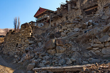 Russia. North-Eastern Caucasus,  Dagestan. The stone houses of the abandoned part of the mountain...