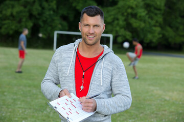 portrait of adult male football coach