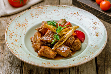 pork ribs with soy sause in Chinese on wooden background