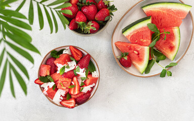 Watermelon salad with strawberries, mint and cheese	