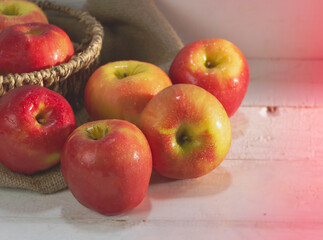 Apple put on wooden timber board,