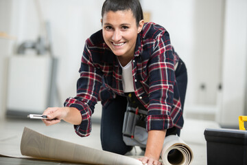 woman worker is using a cutter