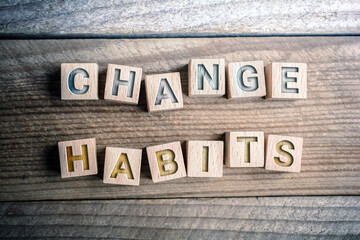 Change Habits Written On Wooden Blocks On A Board