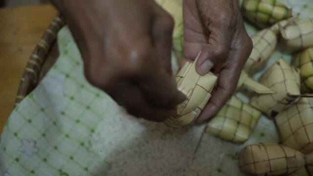 The process of making Ketupat, Indonesian food.