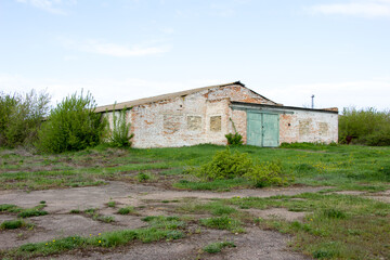 Fototapeta na wymiar Old brick houses abandoned livestock complex built by the USSR Ukraine