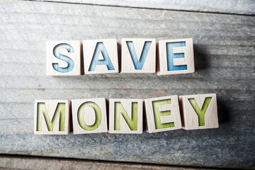 Save Money Written On Wooden Blocks On A Board