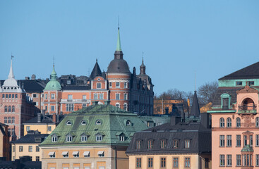 Fototapeta na wymiar The old town Gamla Stan and the blocks surrounding the street Bastugatan in the district Södermalm in Stockholm a spring morning. 21-05-01