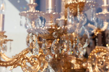 Glass chandeliers with iridescent elements