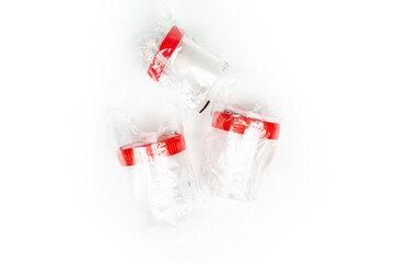 containers for delivery of biomaterial