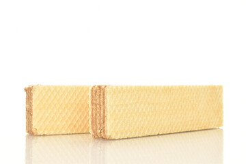 Two sweet vanilla waffles, close-up, isolated on white.