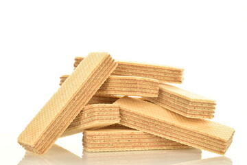 Several vanilla waffles, close-up, isolated on white.