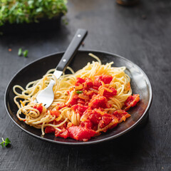 spanetti tomato sauce pasta vegetables dressing italian cuisine meal snack copy space food background rustic. top view keto or paleo diet vegan or vegetarian food