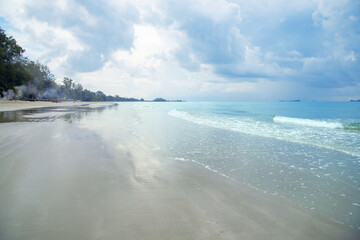   Beach with sea and sky background in the daytime. Concept of long weekend holidays and travel,  Rayong beach, Thailand..