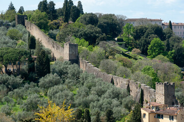 Fototapeta na wymiar Florence, Italy - 2021, April 23: The ancient city walls of Florence, near Forte Belvedere..