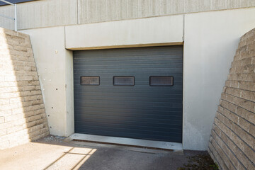 View of automatic closing garage gate. Modern technology concept. Sweden.