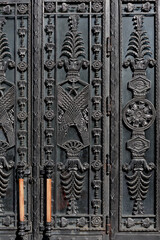 Dusty forged gate door with soviet symbols