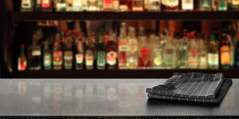 Blurred bar background and desk with napkin 