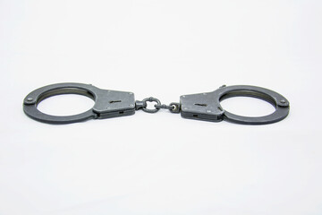 Metal handcuffs, violation of the law, arrest, prison, will, freedom, crime, criminal law,...